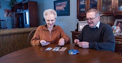 Thomas and Doris Hunsicker playing cards