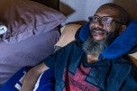 ALS patient who lost his voice uses adaptive computer technology to communicate