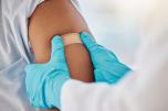 Person receiving flu shot.