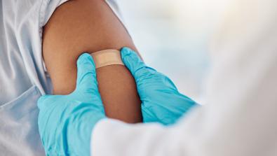 Person receiving flu shot.