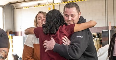 Northampton Regional EMS headquarters with those who had a hand in saving her life.