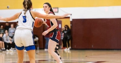 Liberty High School basketball co-captain Emma Pukszyn tore a knee ligament in April 2023. Eight months later, she was back playing again for the Hurricanes.