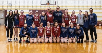 Liberty High School basketball co-captain Emma Pukszyn tore a knee ligament in April 2023. Eight months later, she was back playing again for the Hurricanes.