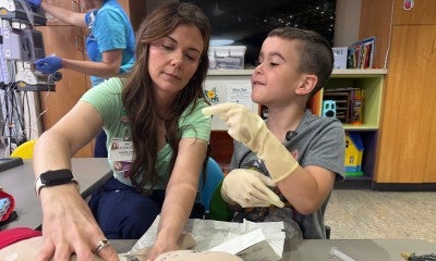 Discover how child life specialists support children's emotional and developmental needs in hospitals. Learn about their skills and certification.