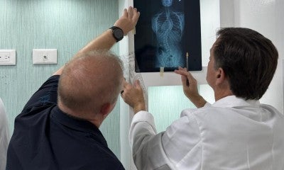 Surgeons on a recent mission trip to the Dominican Republic preform surgeries to correct major spinal deformities.