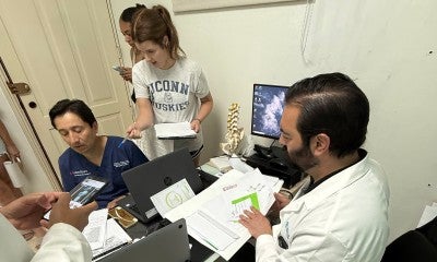 Surgeons on a recent mission trip to the Dominican Republic preform surgeries to correct major spinal deformities.