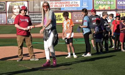 Lori Alfonse, DO, helps throw the first pitch at IronPigs Cancer Survivor Night 2026.