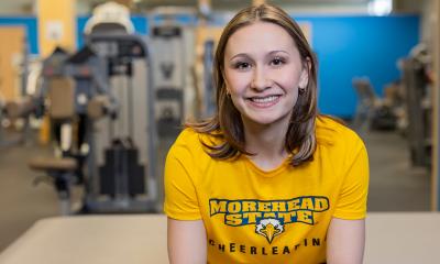 Competitive cheerleader Katie Greb overcame two serious knee injuries to reach her goal of a national championship