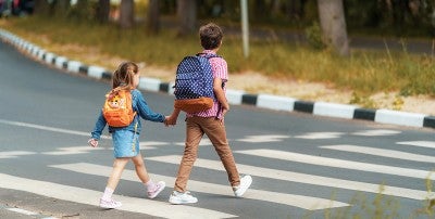 Study up on how you can help keep your school-age child safe while traveling to and from school