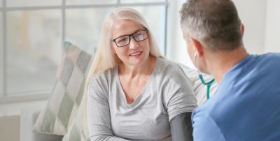 Person getting their blood pressure checked for their stroke risk.