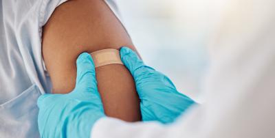 Person receiving flu shot.