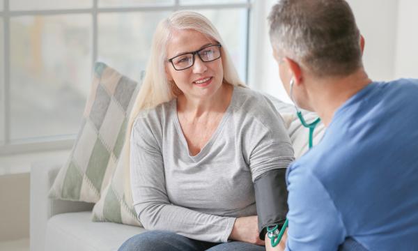 Person getting their blood pressure checked for their stroke risk.
