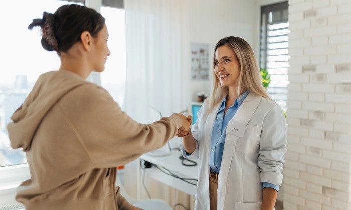 Physician with patient