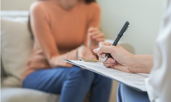 Clinician with patient