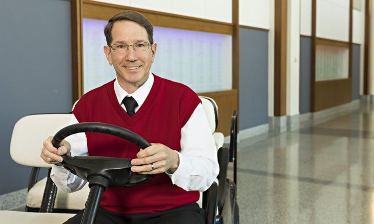 Guest services ambassadors like Rand Kreider drive visitors to locations inside Lehigh Valley Hospital–Cedar Crest