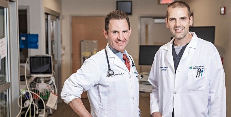 Fellowship Program Director Christopher Melinosky, MD (right) with Assistant Program Director and Co-Director of Neuroscience ICU,  Adam Edwards, MD.