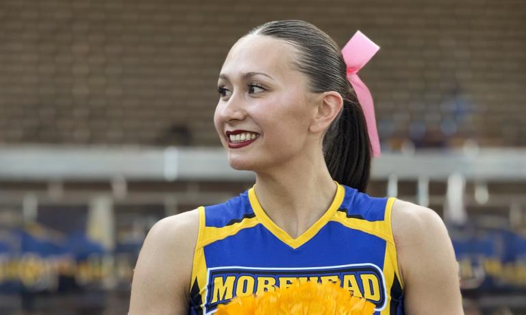 Competitive cheerleader Katie Greb overcame two serious knee injuries to reach her goal of a national championship